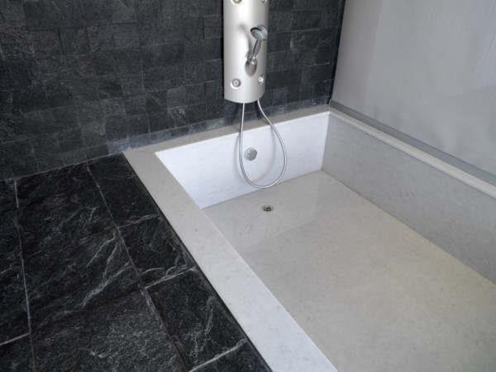 Sunken marble bathtub
